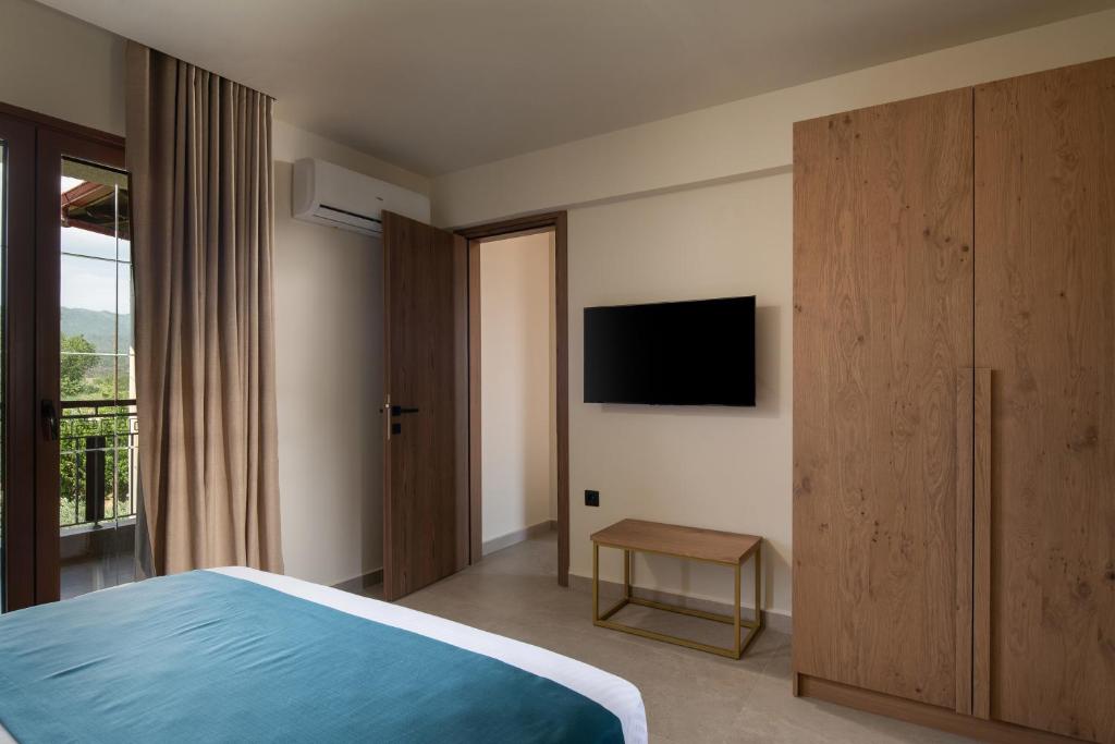 TV a/nebo společenská místnost v ubytování Hotel Pontos