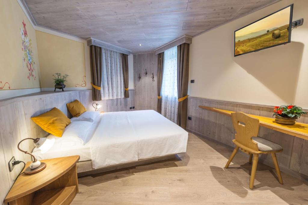 Posteľ alebo postele v izbe v ubytovaní Agritur Casa Fabri