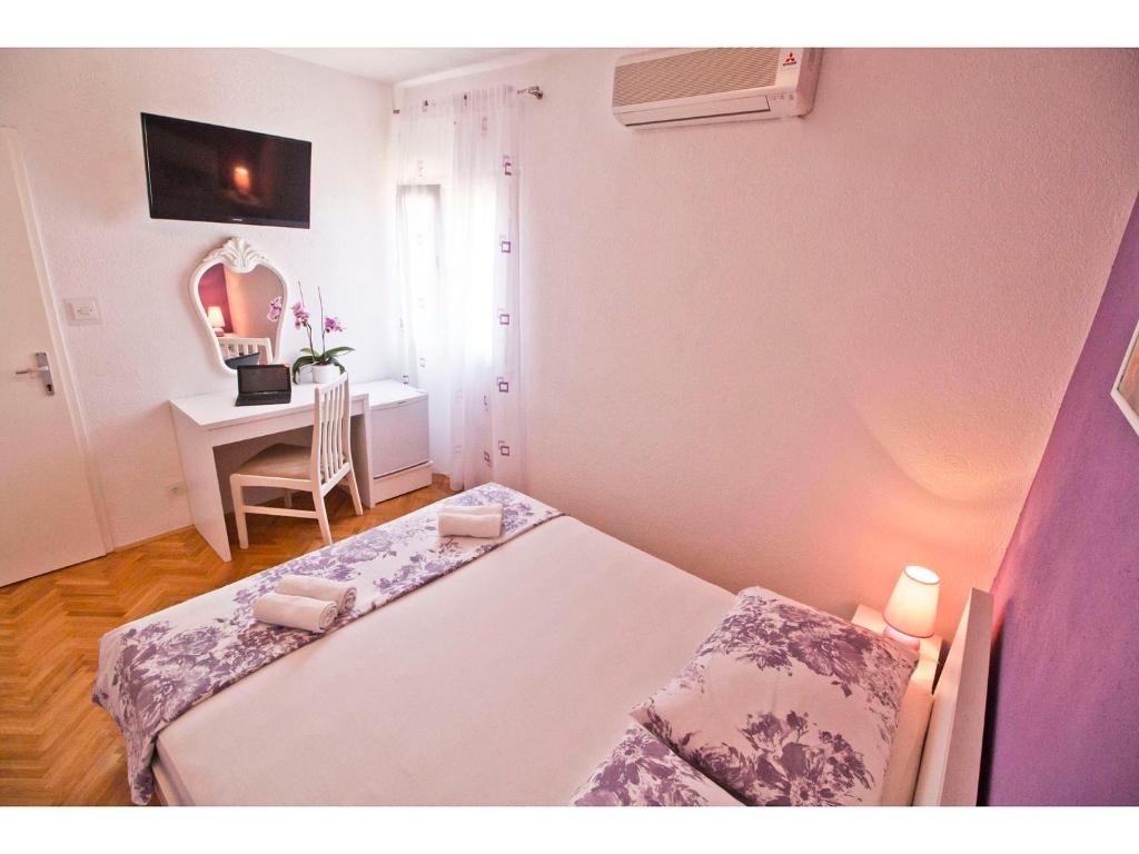 Postel nebo postele na pokoji v ubytování Bol Residence