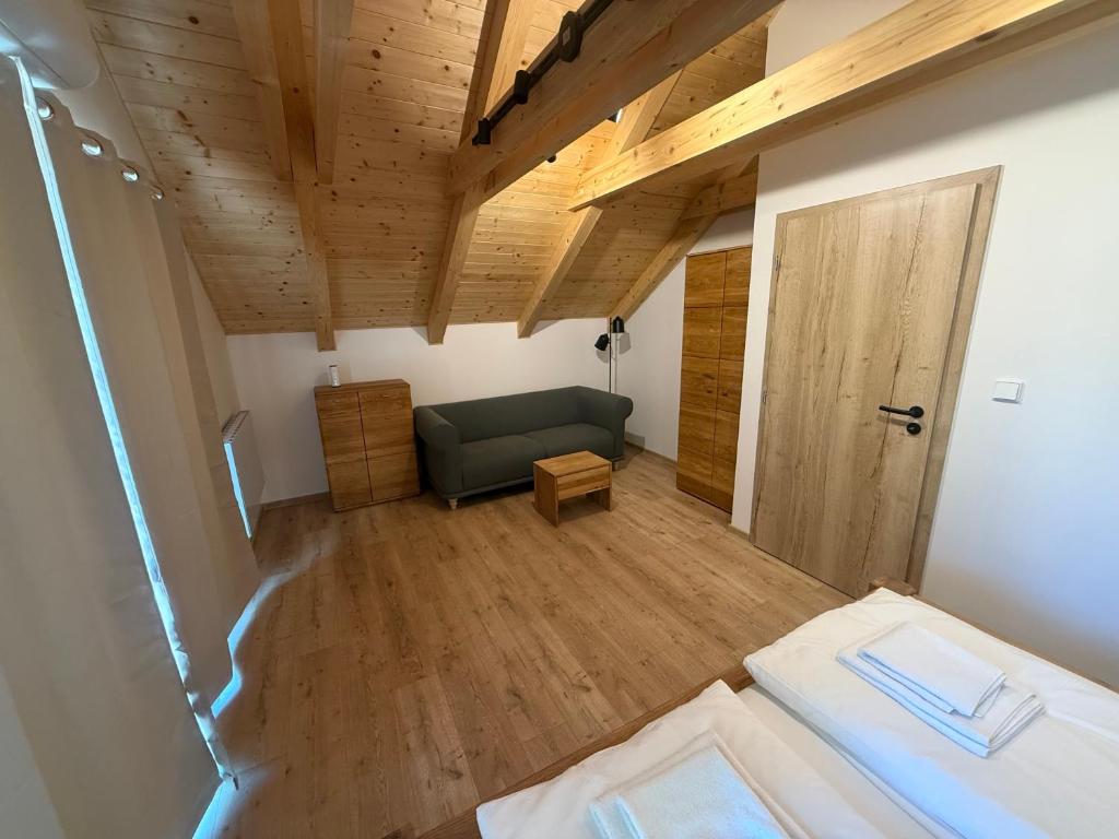 Postel nebo postele na pokoji v ubytování Sklep Sklenka