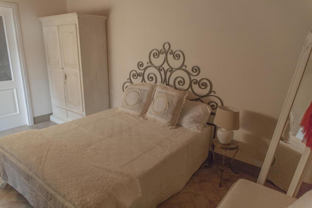 Postel nebo postele na pokoji v ubytování Borgo di Vezzano