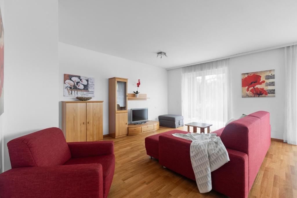 TV a/nebo společenská místnost v ubytování Lux 11