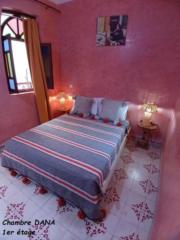 Postel nebo postele na pokoji v ubytování Riad Dantella