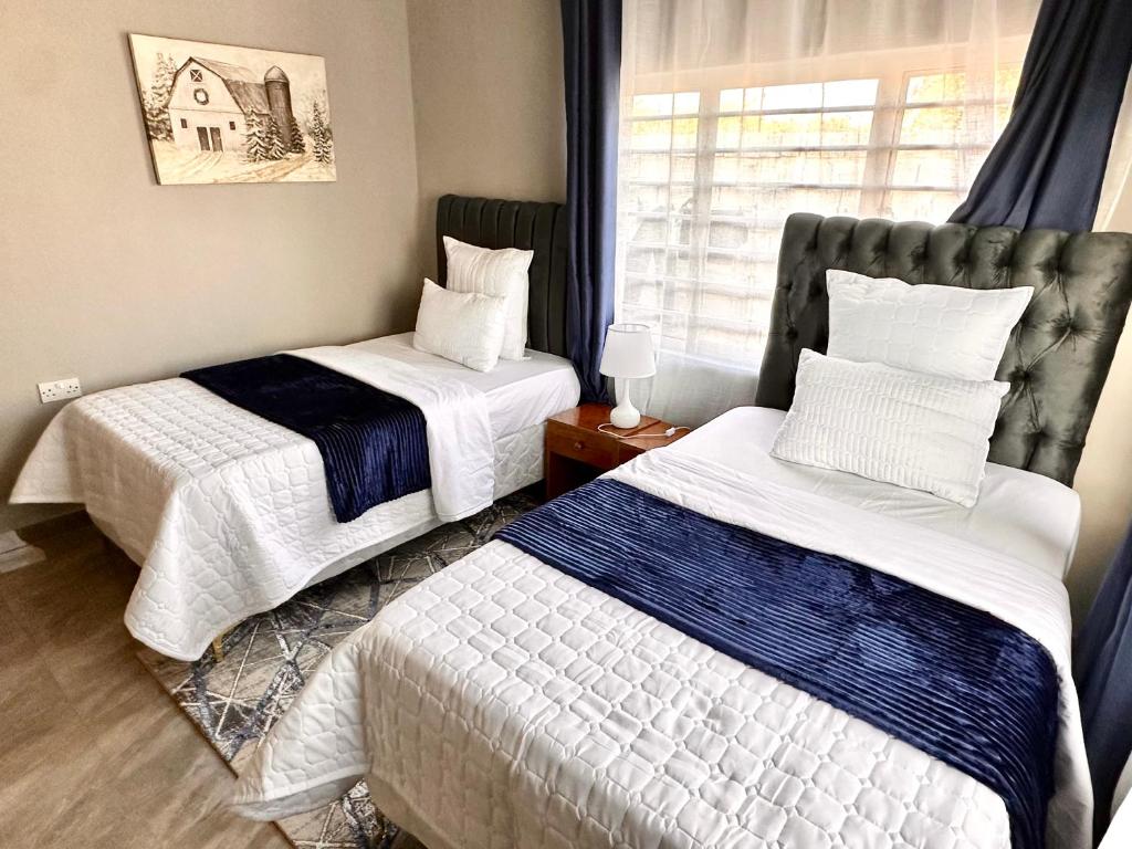 Voodi või voodid majutusasutuse City Escape Apartments toas