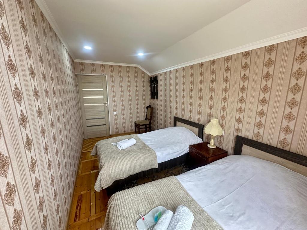 Voodi või voodid majutusasutuse Chkalovka Guest House With Sevan View toas