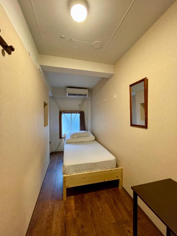 Postel nebo postele na pokoji v ubytování Nomad Hostel East