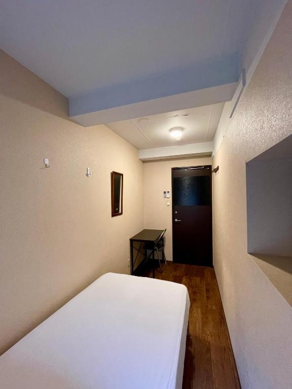 Postel nebo postele na pokoji v ubytování Nomad Hostel East