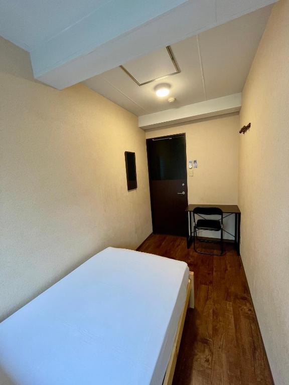 Postel nebo postele na pokoji v ubytování Nomad Hostel East