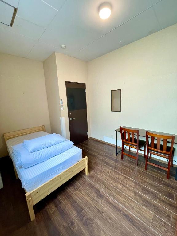 Postel nebo postele na pokoji v ubytování Nomad Hostel East