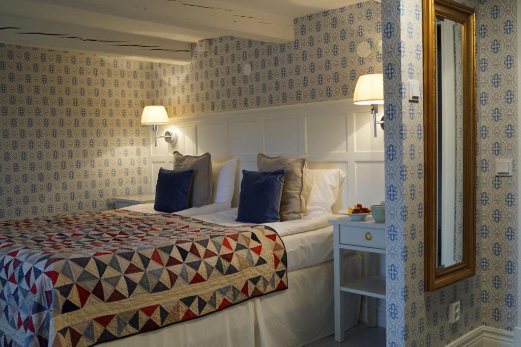 Letto o letti in una camera di Bäckaskog Slott