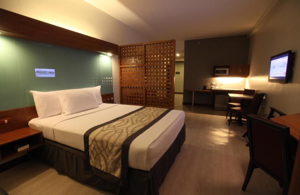 Voodi või voodid majutusasutuse Microtel by Wyndham UP Technohub toas