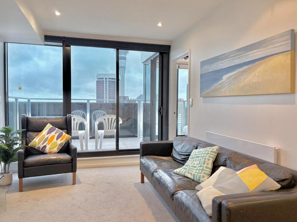 Sky Tower Views High-Floor Apt Pool Gym Access - Resim 8