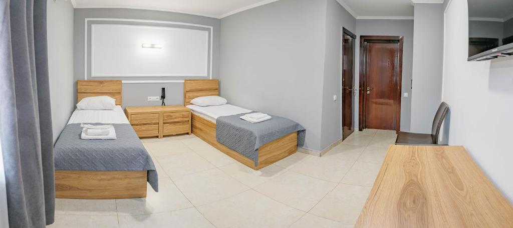 Postel nebo postele na pokoji v ubytování Route Hotel