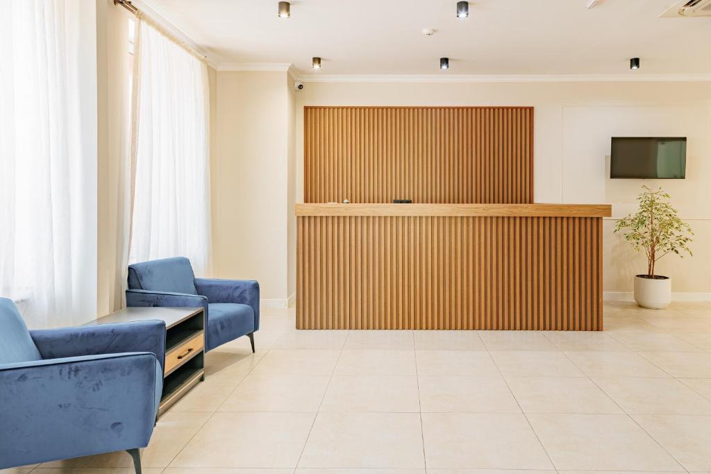 TV a/nebo společenská místnost v ubytování Route Hotel