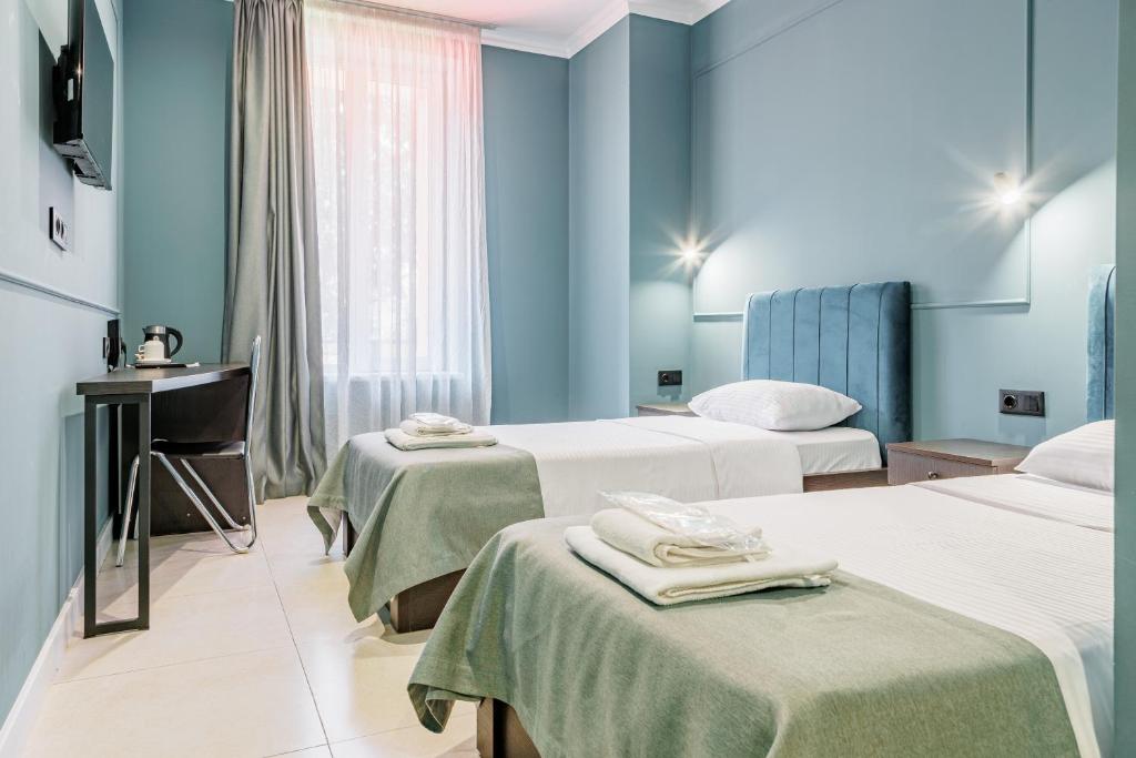 Postel nebo postele na pokoji v ubytování Route Hotel