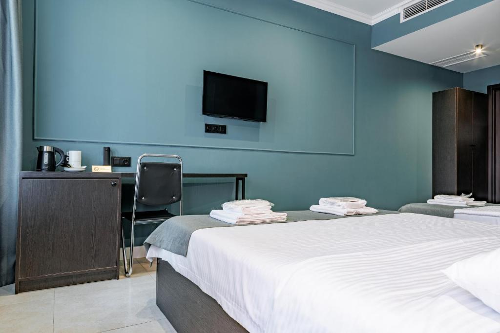 Postel nebo postele na pokoji v ubytování Route Hotel