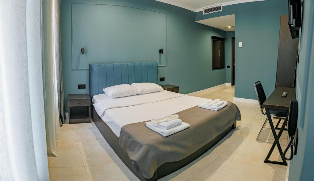 Postel nebo postele na pokoji v ubytování Route Hotel