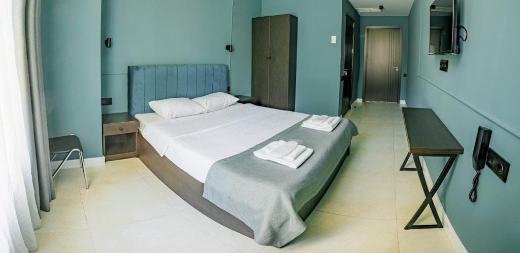 Postel nebo postele na pokoji v ubytování Route Hotel