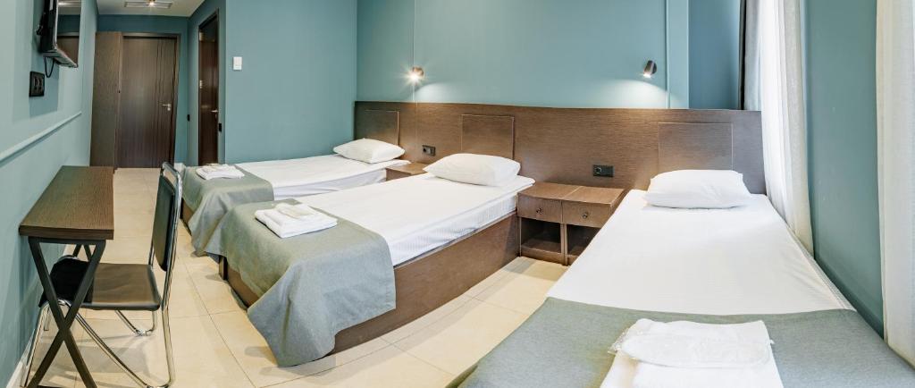 Postel nebo postele na pokoji v ubytování Route Hotel