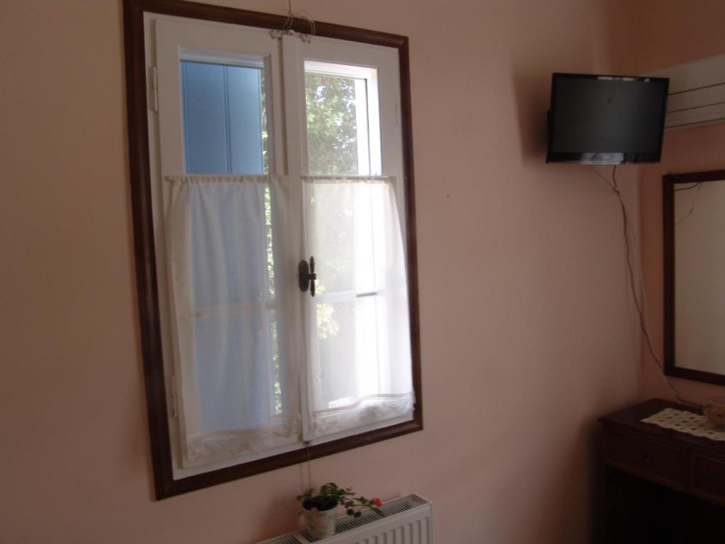 TV a/nebo společenská místnost v ubytování Aiolos Rooms