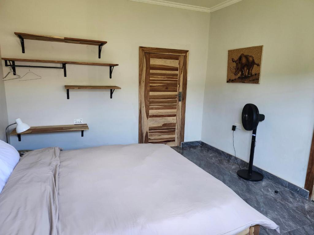 Ένα ή περισσότερα κρεβάτια σε δωμάτιο στο Jacana Apartments