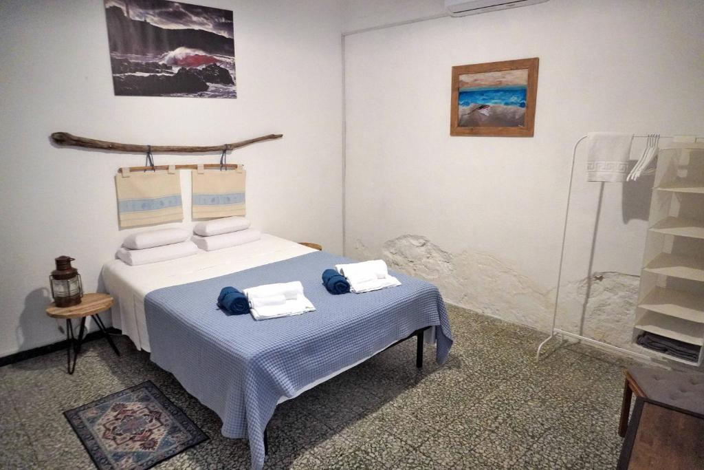 Postel nebo postele na pokoji v ubytování Safeheaven Sardinia