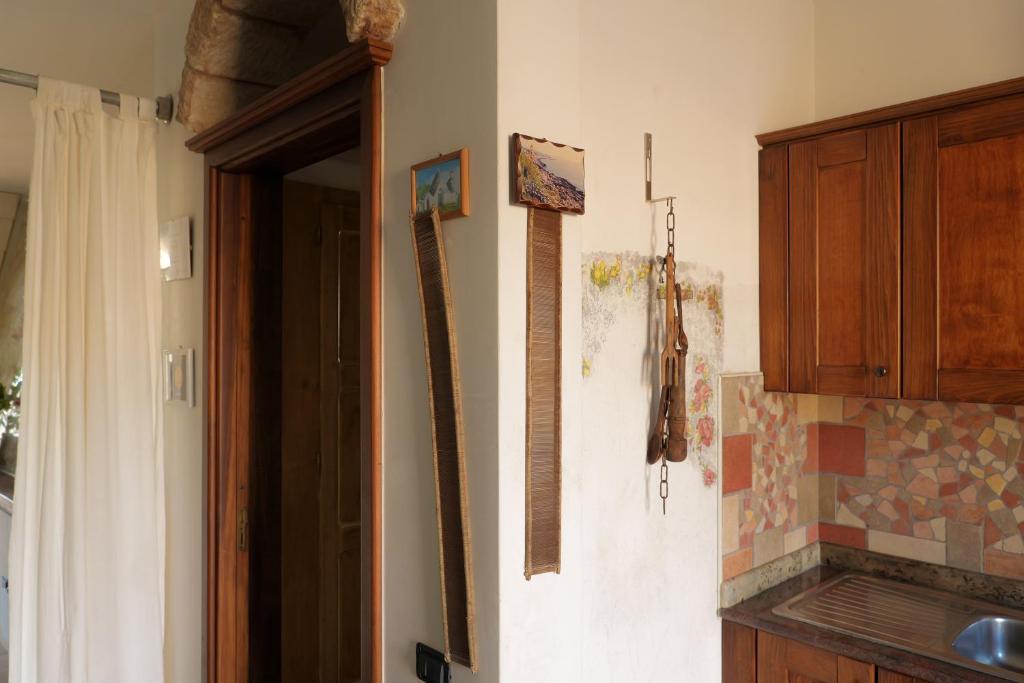 Kuchyň nebo kuchyňský kout v ubytování Palacca, trullo salentino