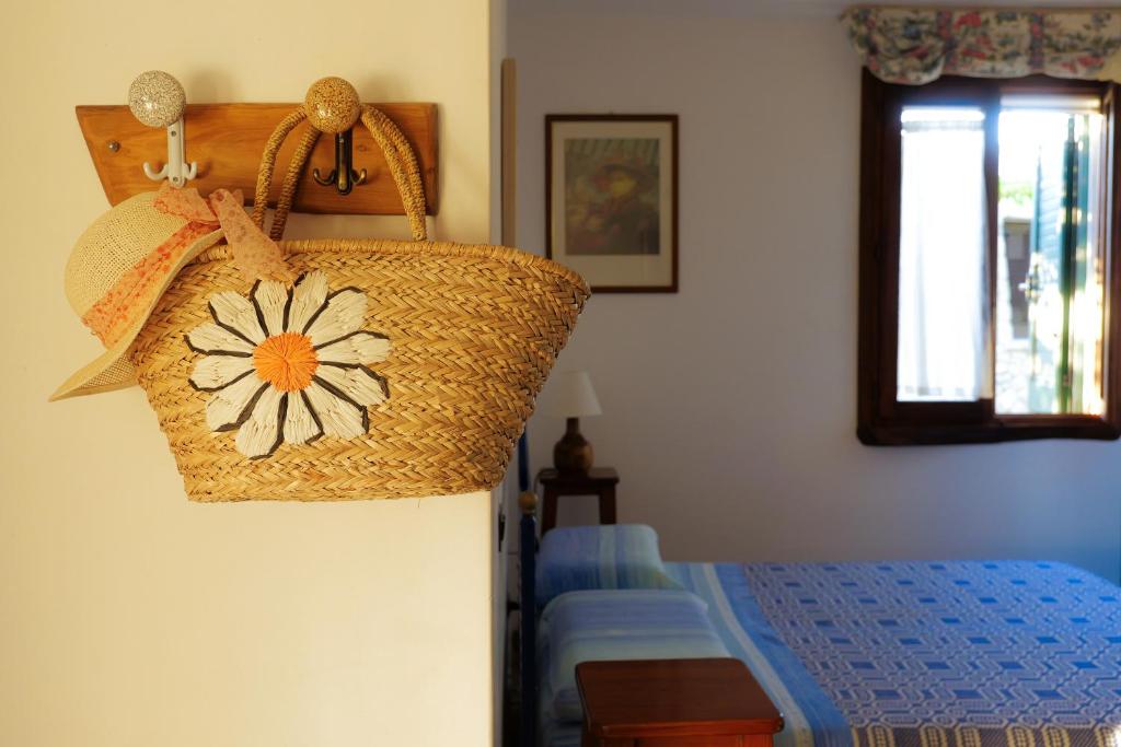 Postel nebo postele na pokoji v ubytování Palacca, trullo salentino