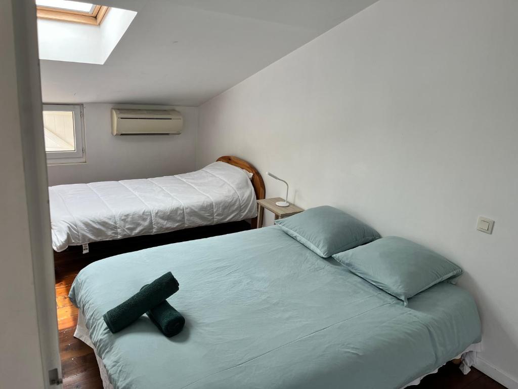 Postel nebo postele na pokoji v ubytování Maison avec vue sur le Viscos