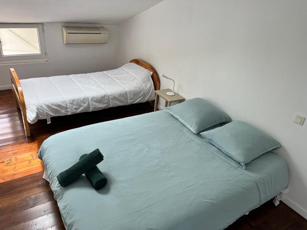 Postel nebo postele na pokoji v ubytování Maison avec vue sur le Viscos