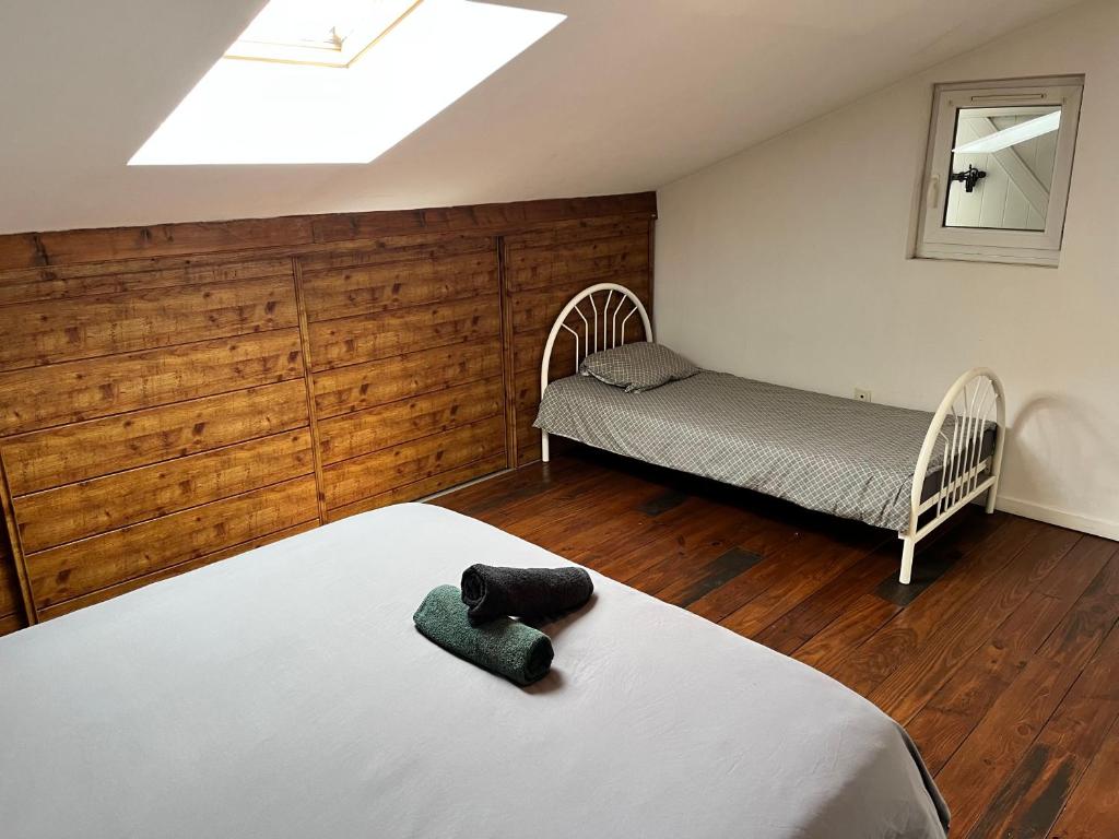 Postel nebo postele na pokoji v ubytování Maison avec vue sur le Viscos