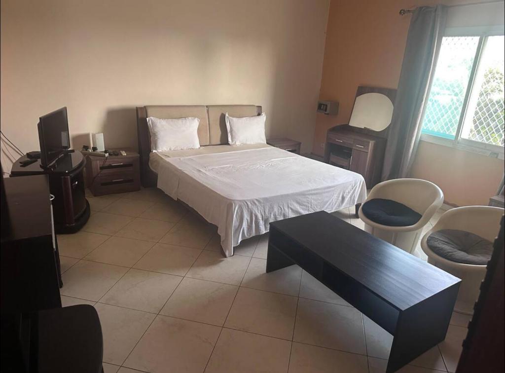 Postel nebo postele na pokoji v ubytování Al Mamoun Hotel