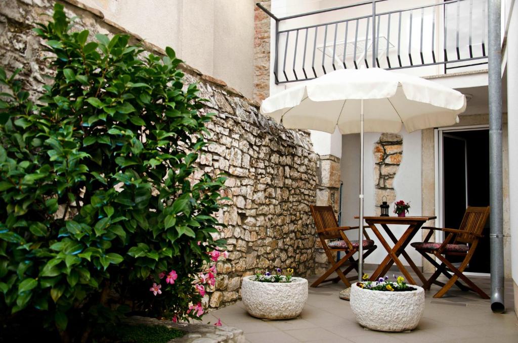 Patio nebo venkovní prostory v ubytování Apartments Percic