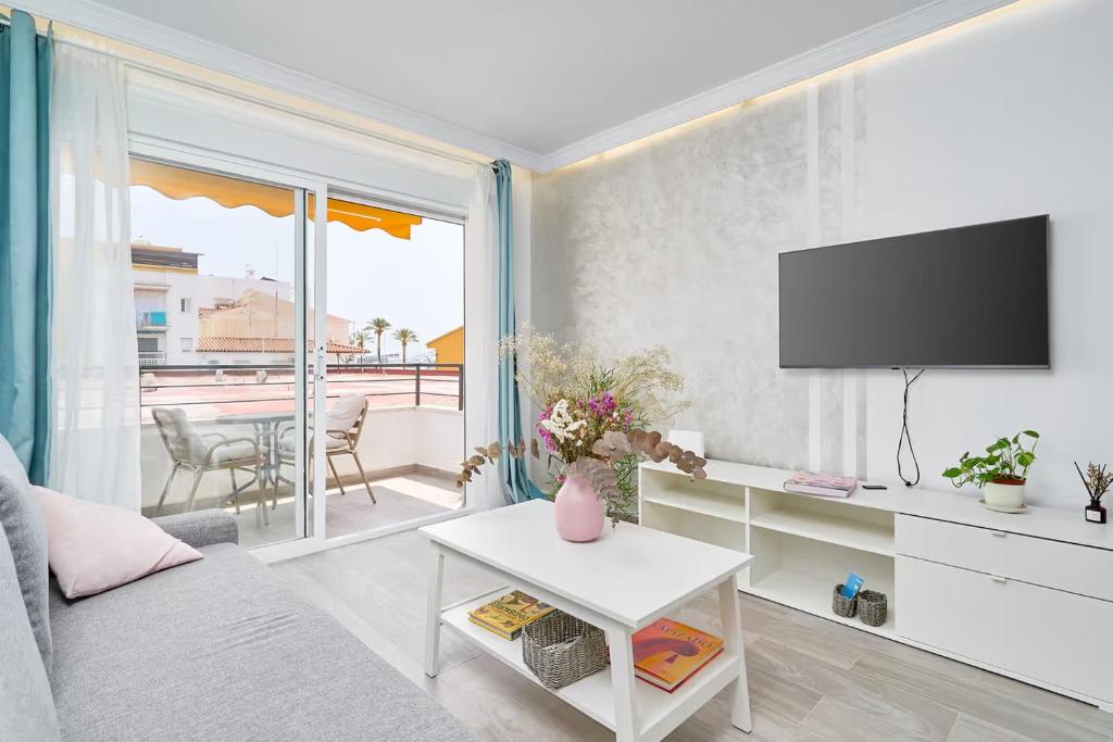 Et tv og/eller underholdning på Beachside Bliss