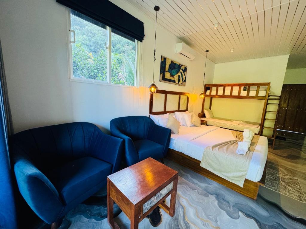 Postel nebo postele na pokoji v ubytování River Splendour Home Stay