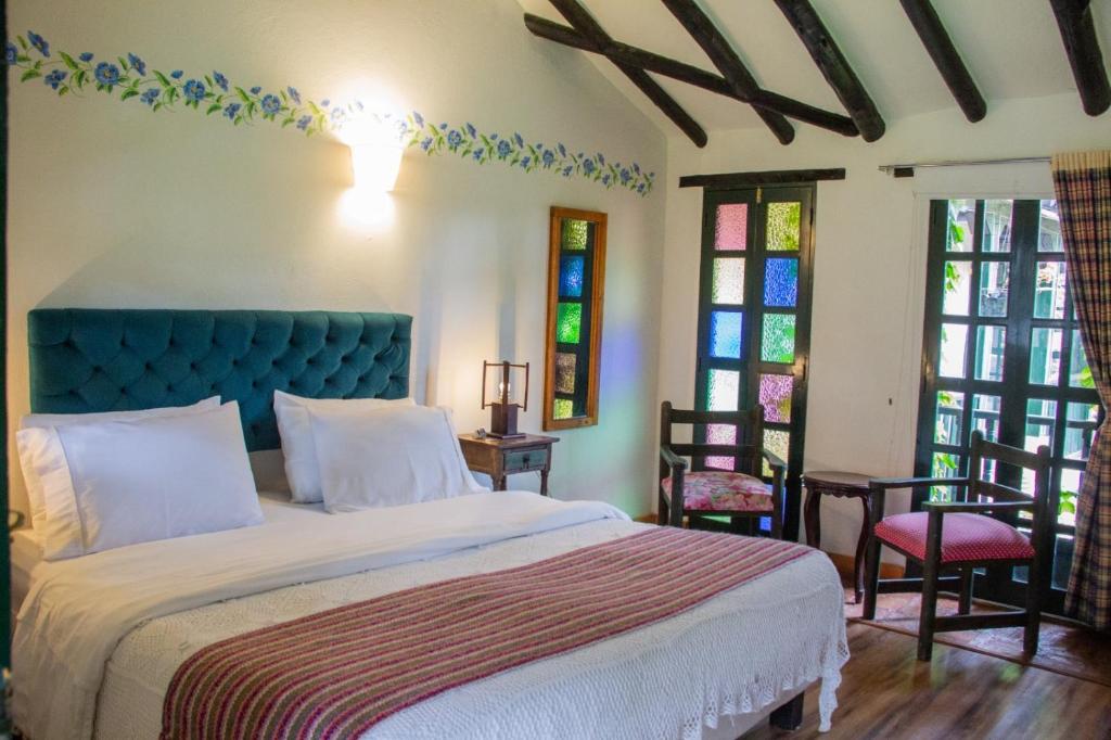 Voodi või voodid majutusasutuse Casa San Nicolas toas