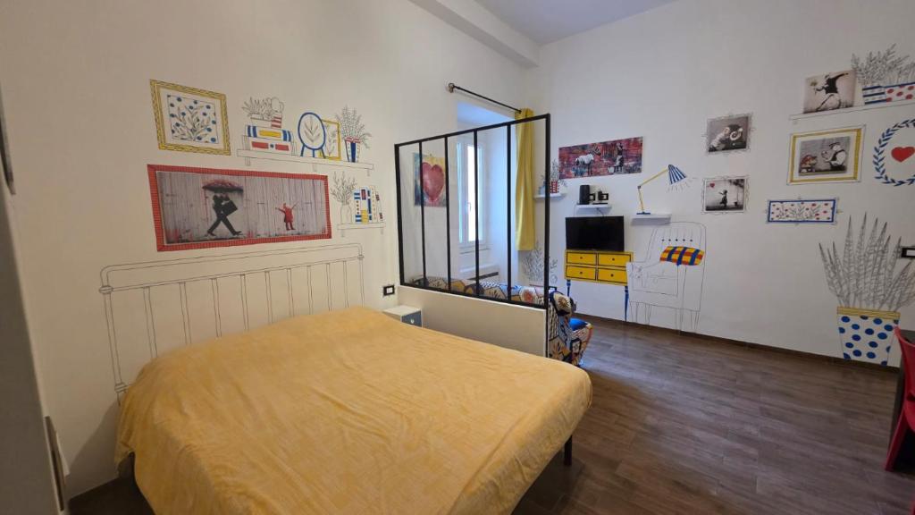 Posteľ alebo postele v izbe v ubytovaní CASA DI SILVIA a PORTA PIA