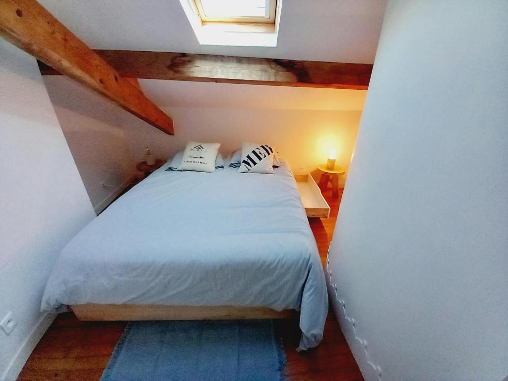 Ένα ή περισσότερα κρεβάτια σε δωμάτιο στο La Casa des Marais