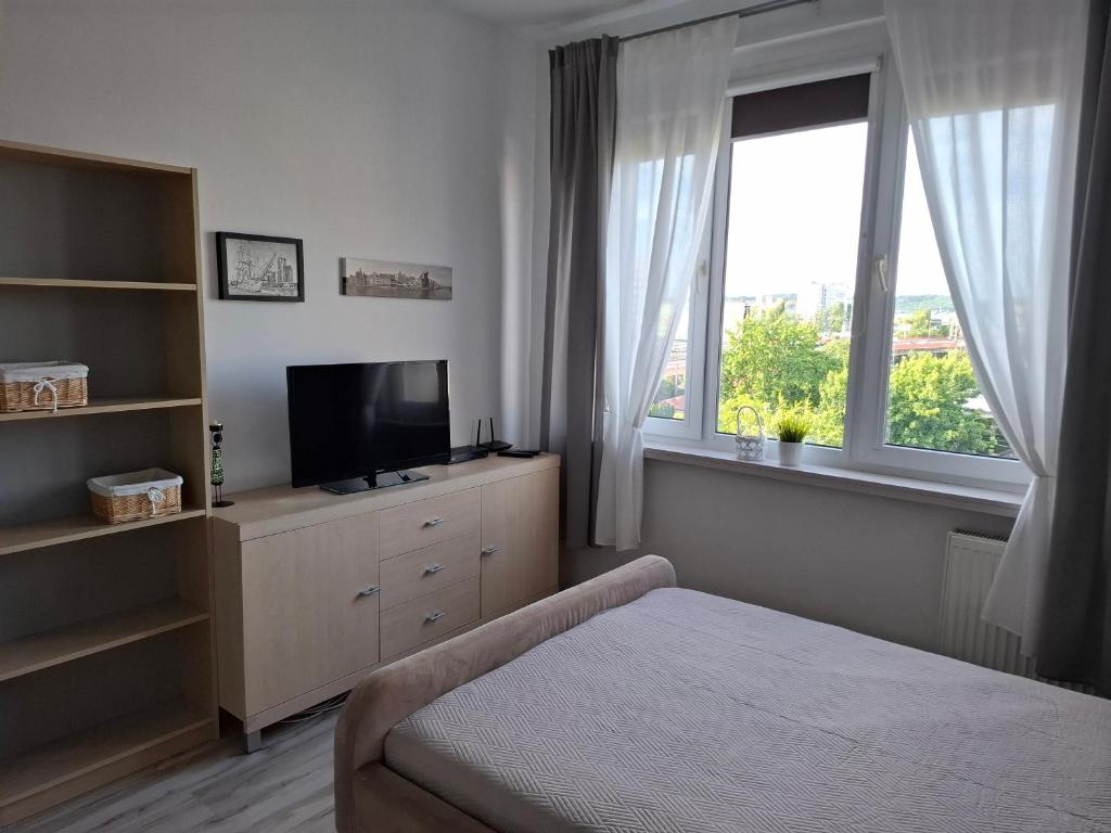 Posteľ alebo postele v izbe v ubytovaní Apartament MORSKA 148 Gdynia 65m2
