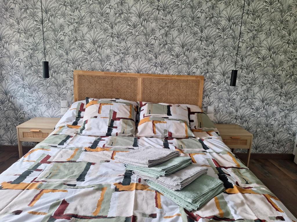 Postel nebo postele na pokoji v ubytování le Nolaytoît