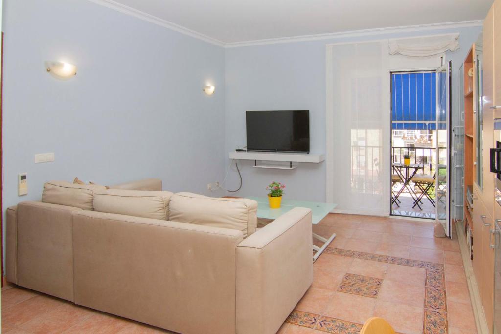 Μια τηλεόραση ή/και κέντρο ψυχαγωγίας στο Apartamentos CAPRIMAR