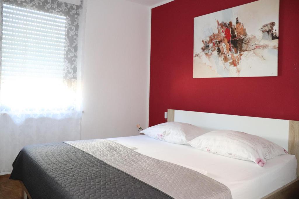 Postel nebo postele na pokoji v ubytování Apartments ZVEZDICA*** with garden