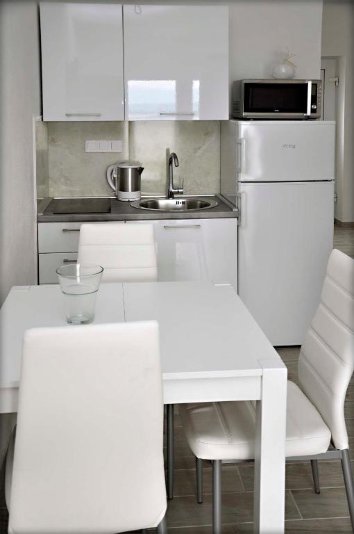 Kuchyň nebo kuchyňský kout v ubytování Apartments Magdalena