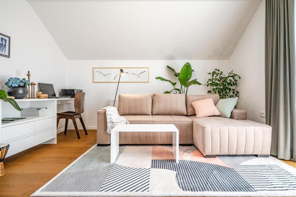 Ένα ή περισσότερα κρεβάτια σε δωμάτιο στο Strato Apartment