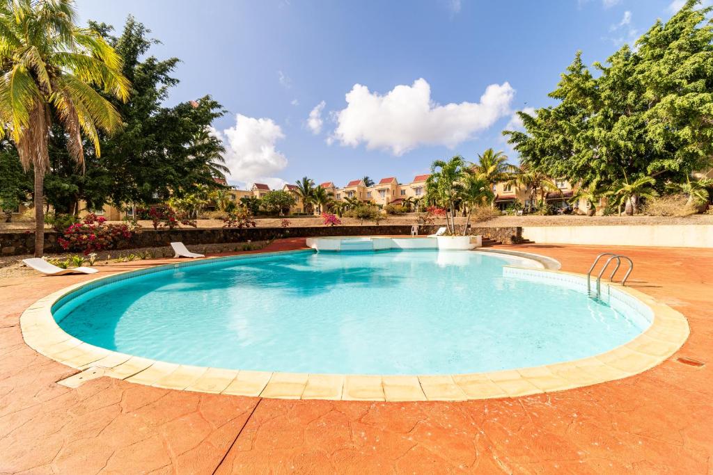 Bazén v ubytování L'Oasis des Vacances nebo v jeho okolí