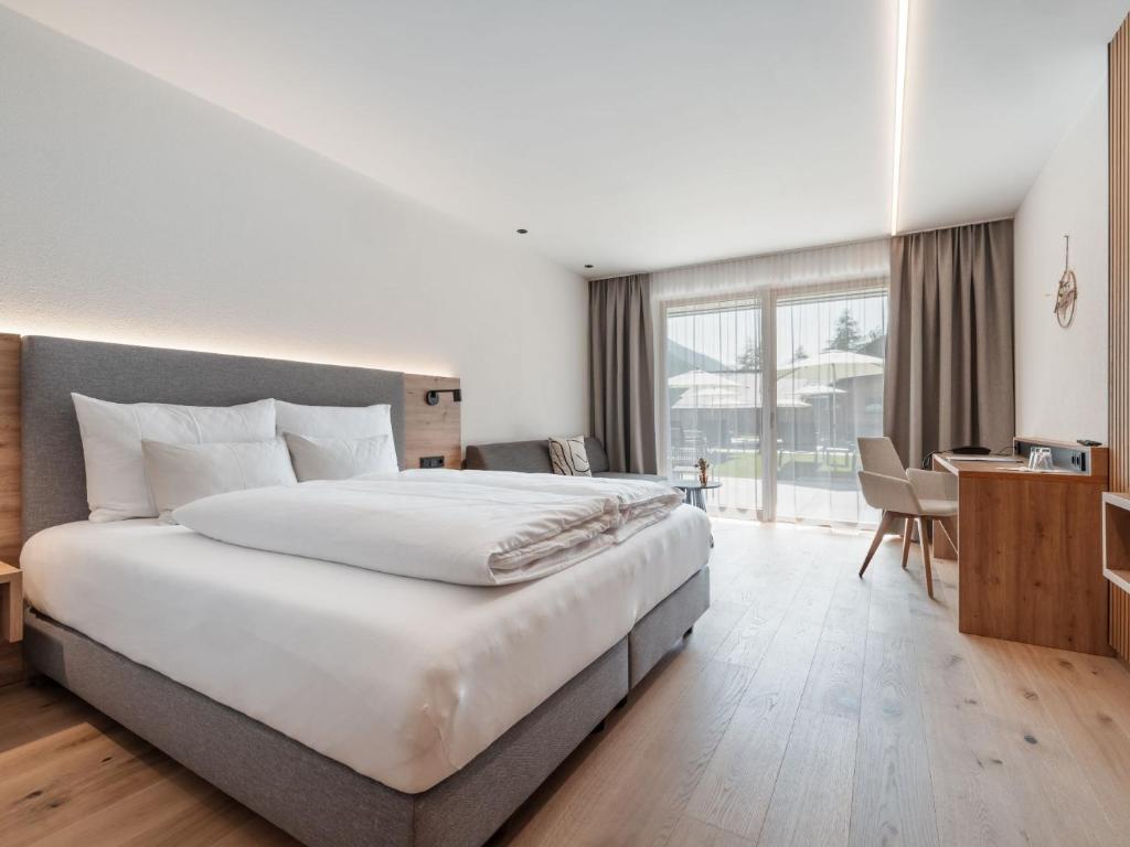 Postel nebo postele na pokoji v ubytování Hotel Traube