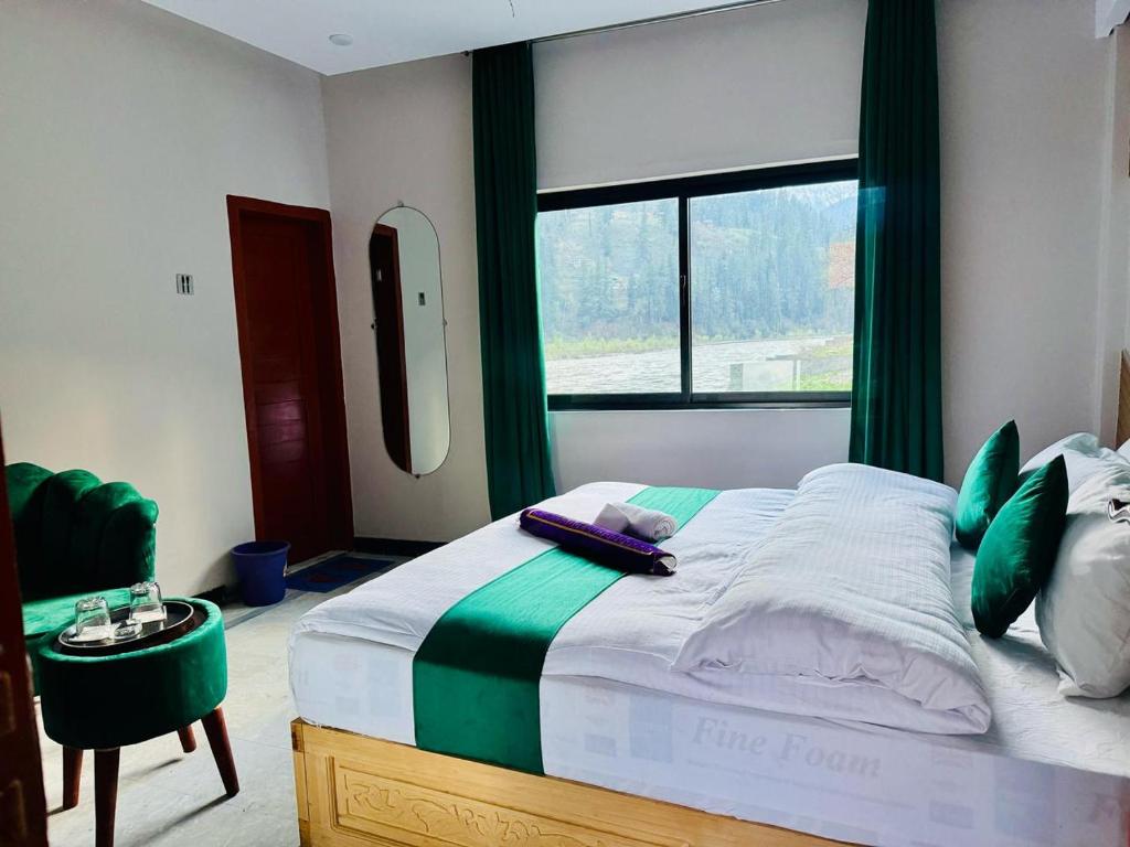 Postel nebo postele na pokoji v ubytování Travelers choice resort Sharda