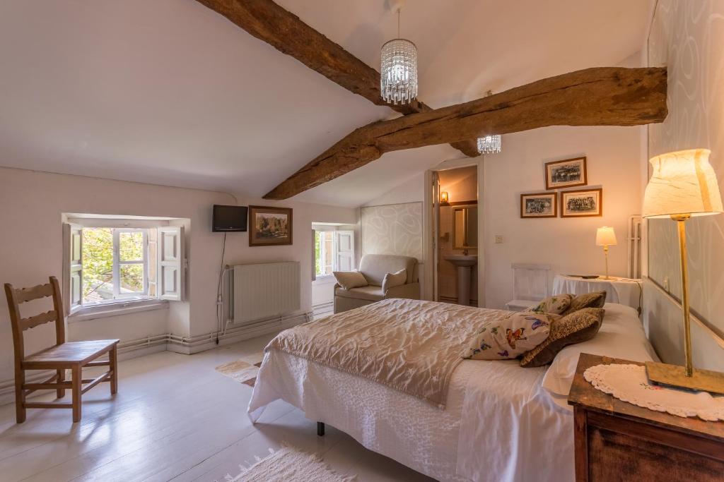 Postel nebo postele na pokoji v ubytování vaquero casa rural alquiler completo