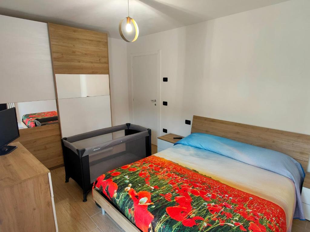 Ένα ή περισσότερα κρεβάτια σε δωμάτιο στο La casa di Nicole