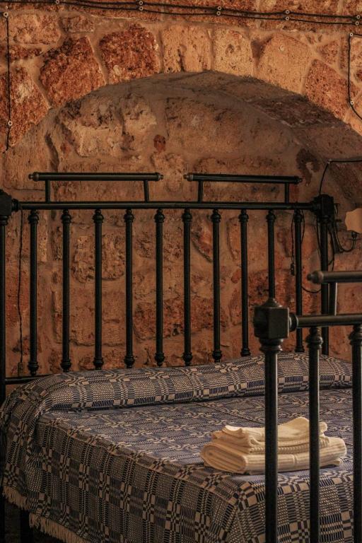 Postel nebo postele na pokoji v ubytování B&B Pergulea